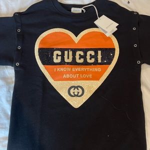 Gucci kids sweater (fits like an xs adult) detachable sleeves.